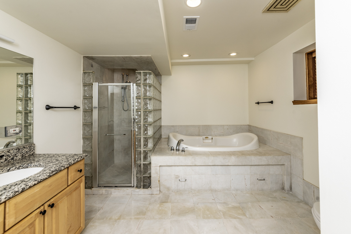 4625 North Dover Street, Unit G Chicago, IL 60640 - Photo 24 of 26 a bathroom with a sink a toilet and shower