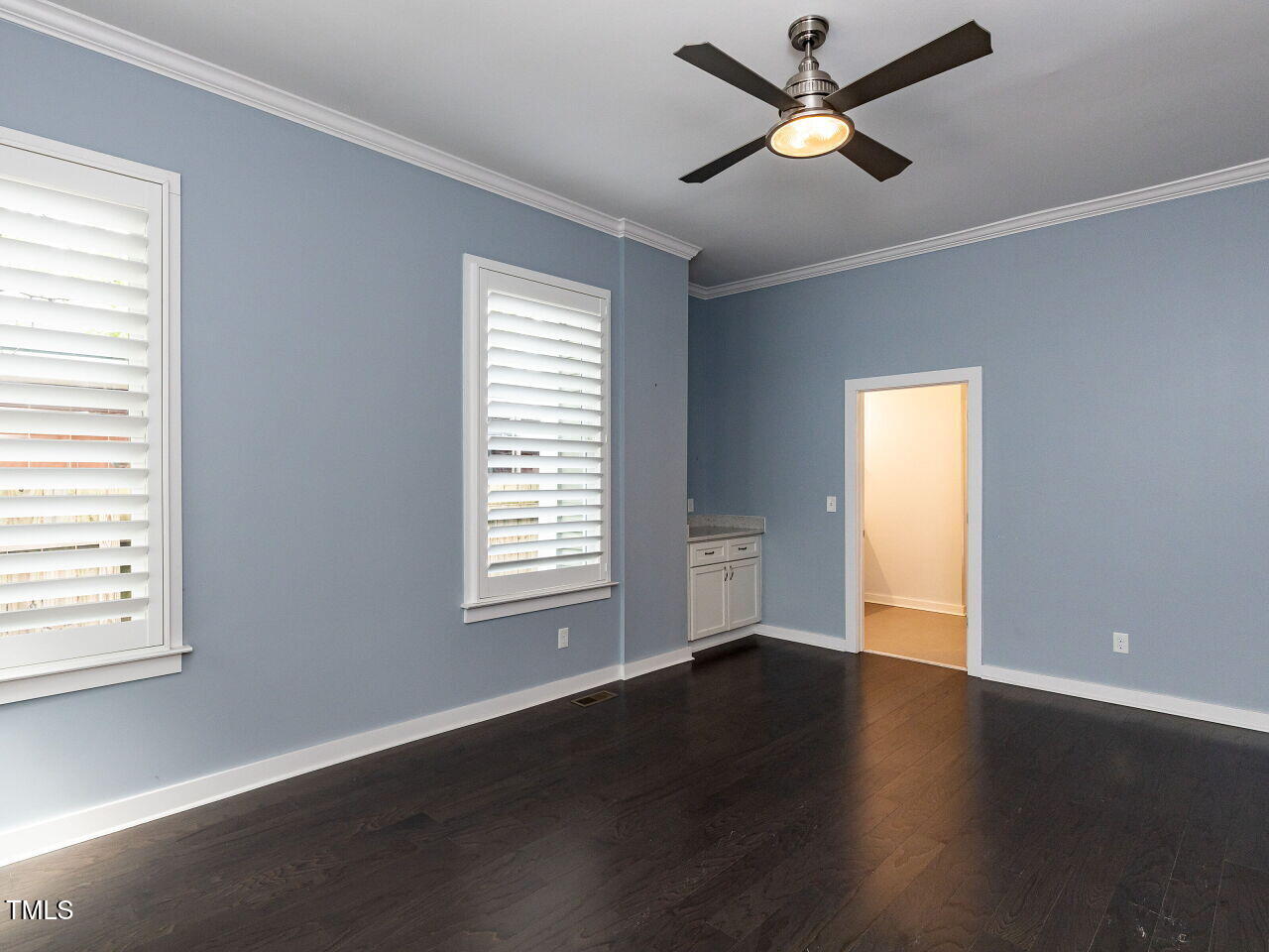 314 Gray Avenue Durham, NC 27701 - Photo 13 of 30 a view of empty room with wooden floor and fan