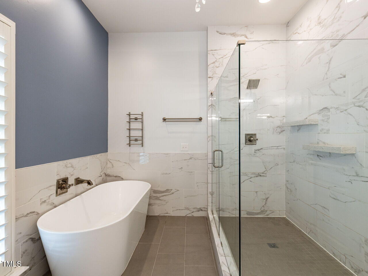 314 Gray Avenue Durham, NC 27701 - Photo 17 of 30 a bathroom with a bathtub and shower