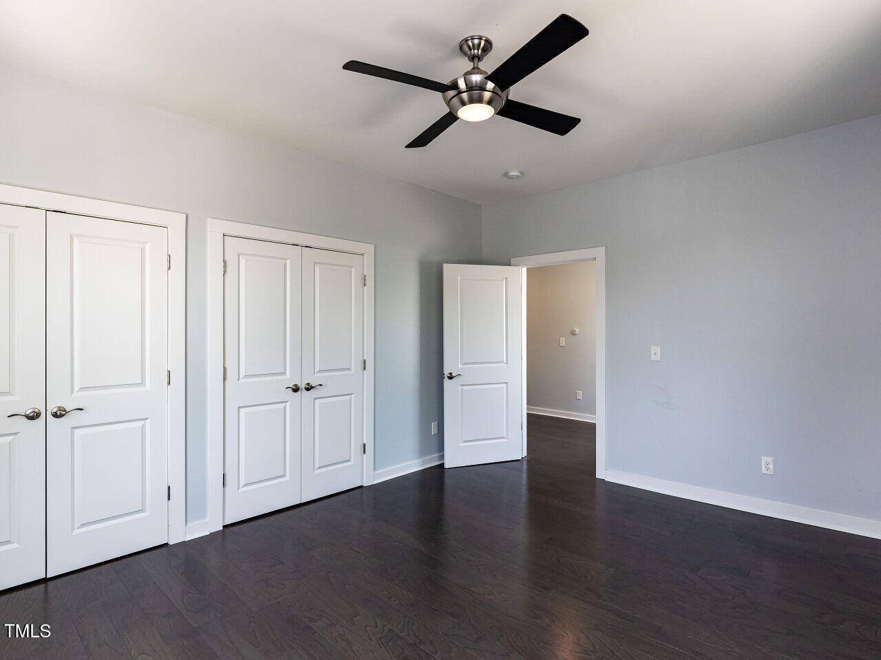 314 Gray Avenue Durham, NC 27701 - Photo 20 of 30 an empty room with wooden floor and windows