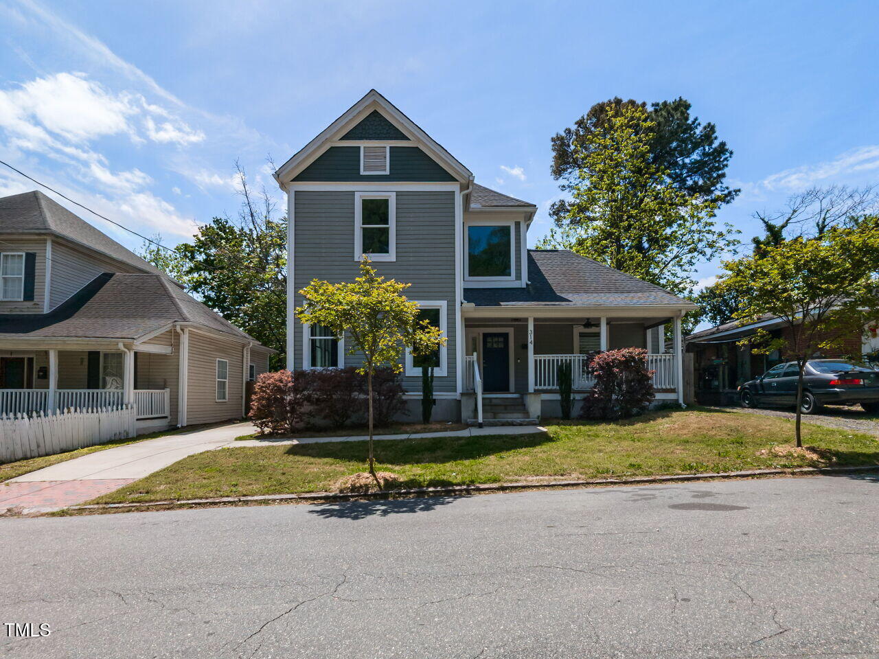 314 Gray Avenue Durham, NC 27701 - Photo 2 of 30 a view of a house with swimming pool and sitting area
