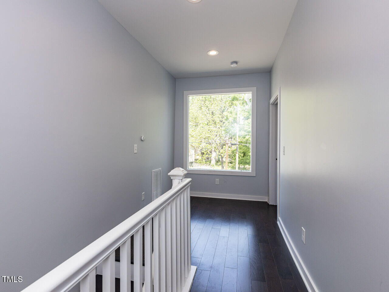 314 Gray Avenue Durham, NC 27701 - Photo 24 of 30 a view of hallway with wooden floor