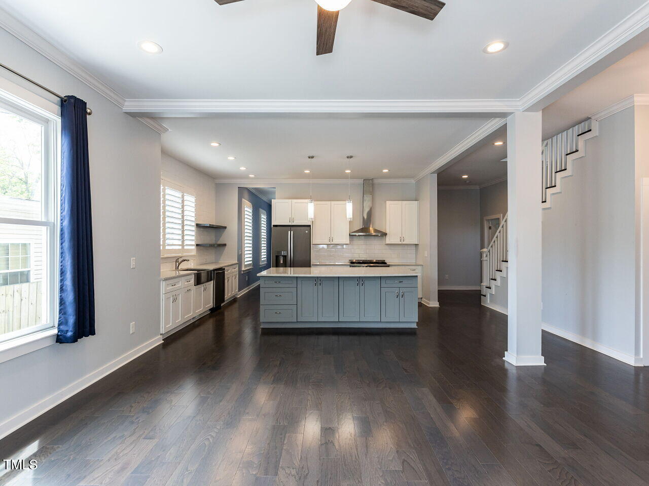 314 Gray Avenue Durham, NC 27701 - Photo 7 of 30 a large white kitchen with a large window