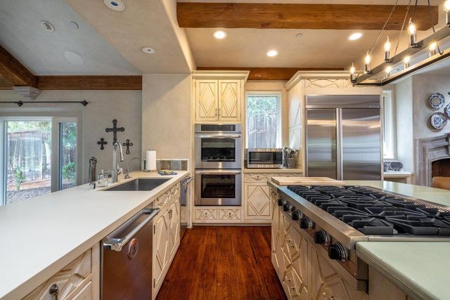 a dining room with furniture wooden floor and a table