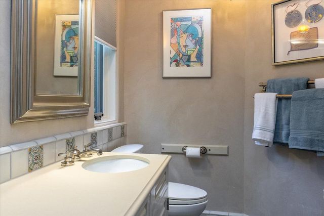 a bedroom with wooden floor