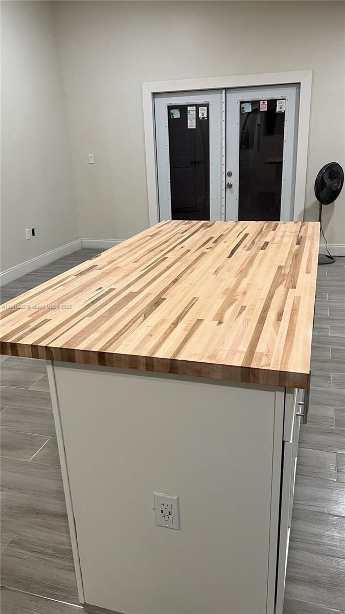 Sunset Miami, FL 33173 - Photo 17 of 41 a bedroom with a bed and a mirror