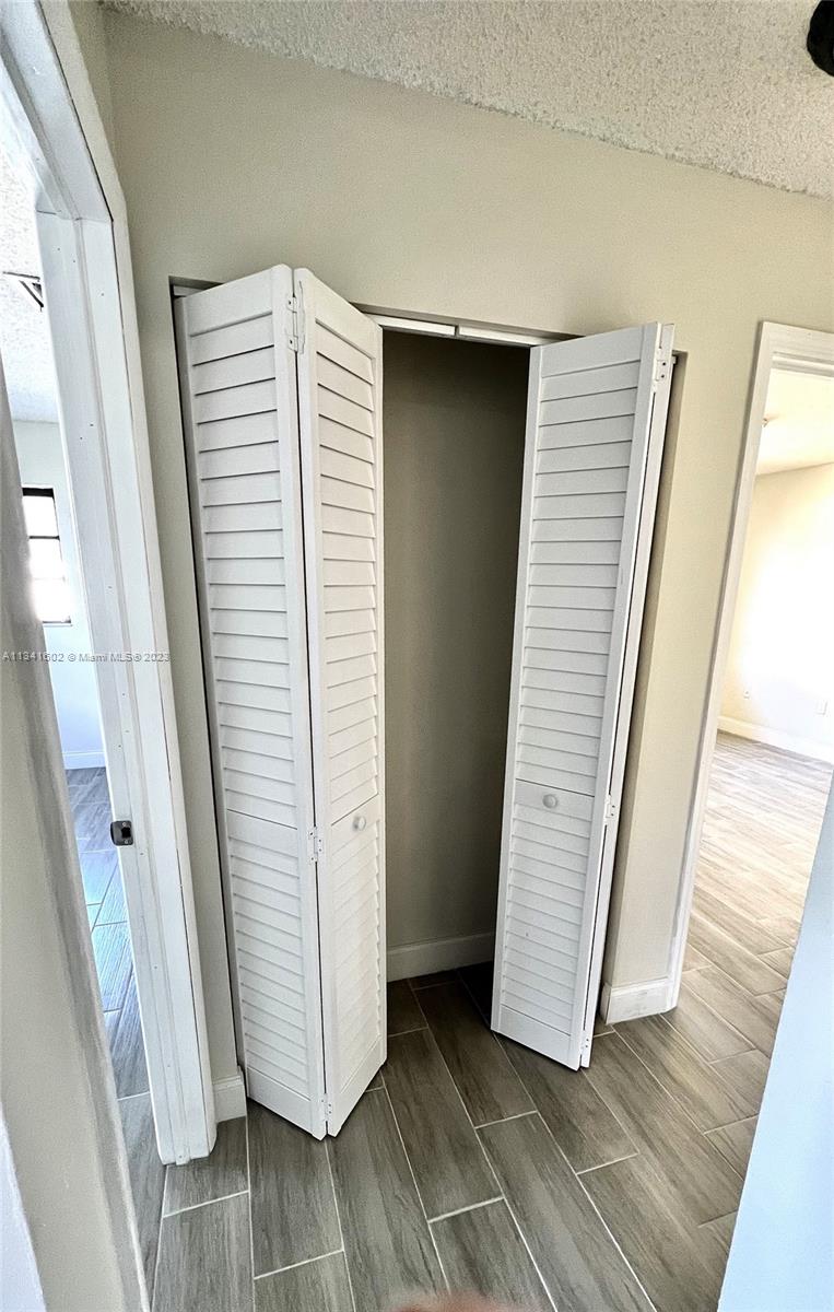 Sunset Miami, FL 33173 - Photo 30 of 41 a view of a hallway with closet