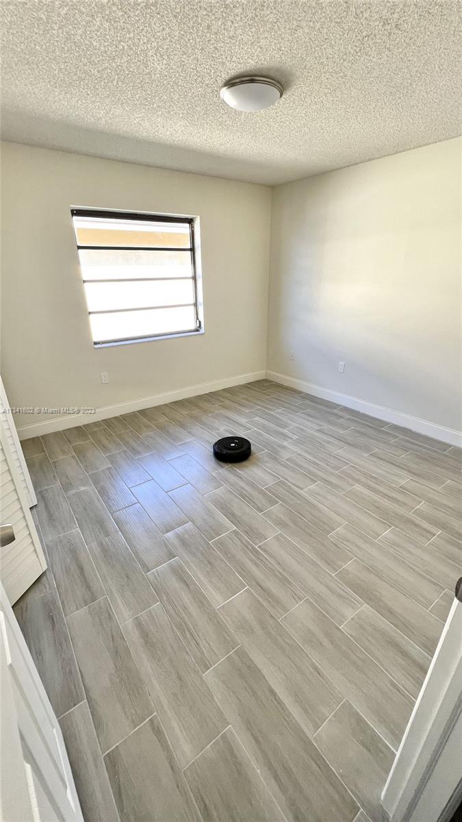 Sunset Miami, FL 33173 - Photo 36 of 41 an empty room with windows