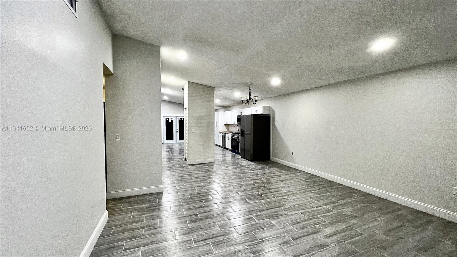 Sunset Miami, FL 33173 - Photo 5 of 41 a view of a livingroom with wooden floor