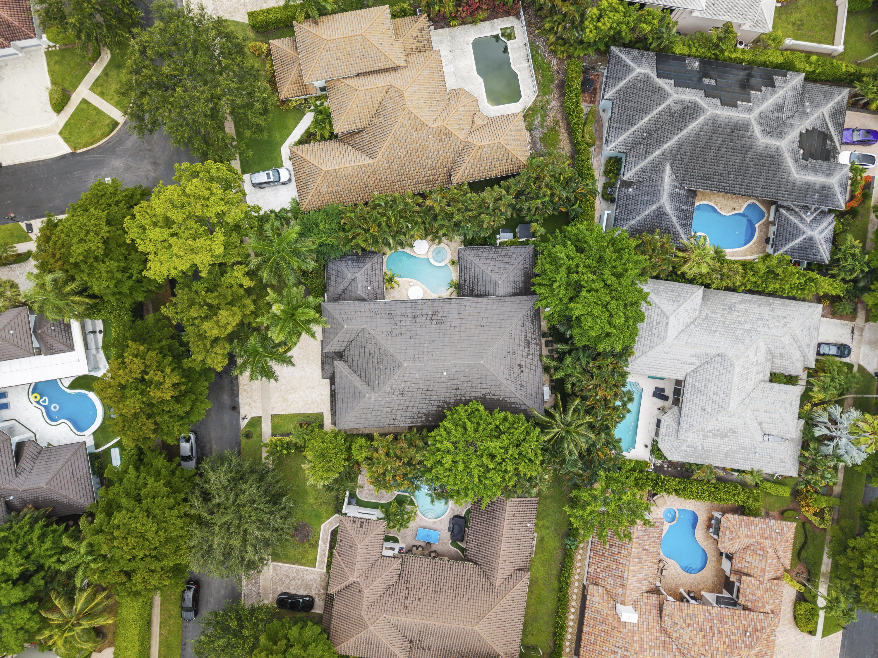 3156 Northwest 61st Street Boca Raton, FL 33496 - Photo 46 of 46 an aerial view of a house with a yard and garden