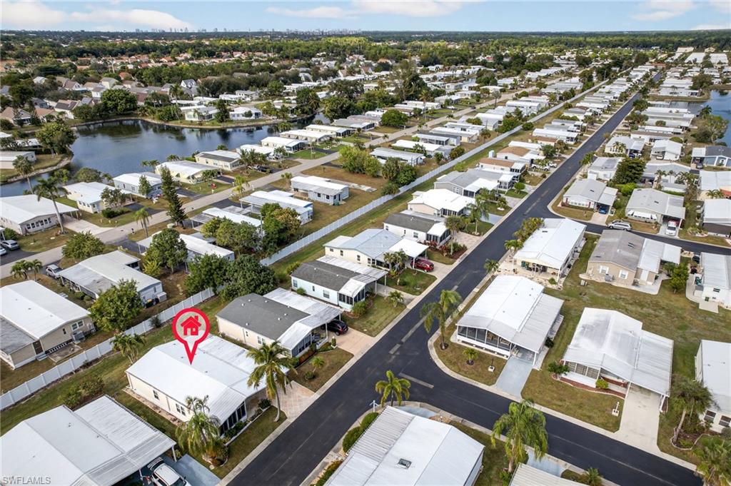 212 Oceans Boulevard, Unit 212 Naples, FL 34104 - Photo 27 of 30 an aerial view of residential houses with outdoor space