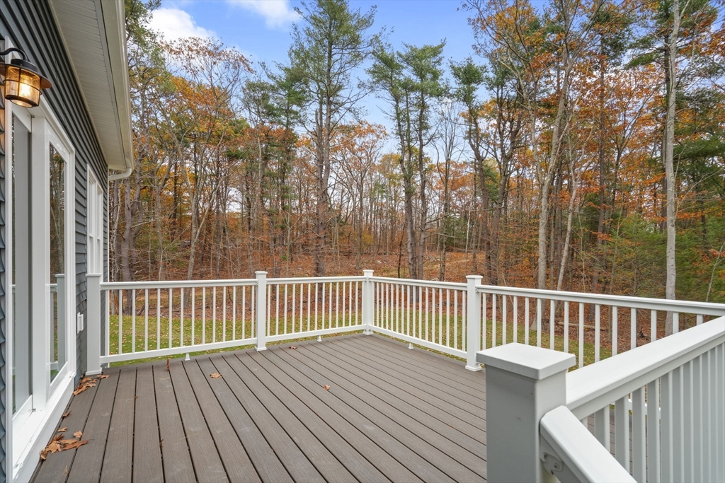 29-4 Sunset Road Westminster, MA 01473 - Photo 28 of 37 a view of a wooden roof deck