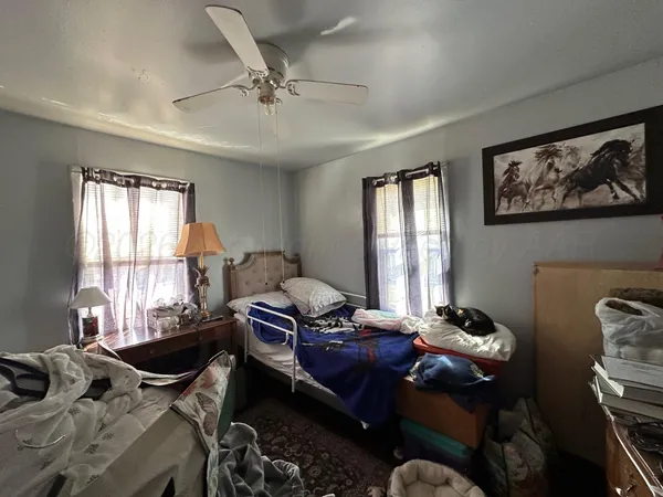 a living room with furniture and window