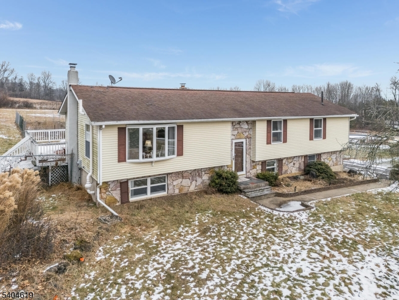 11 Cemetery Road Blairstown, NJ 07825 - Photo 16 of 34 a house view with a backyard space