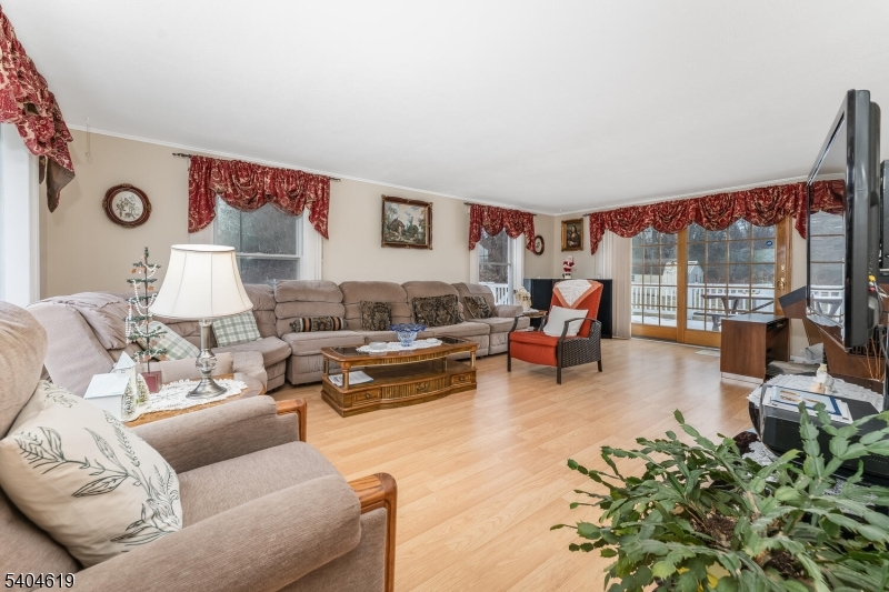 11 Cemetery Road Blairstown, NJ 07825 - Photo 17 of 34 a living room with furniture or couch and a large window