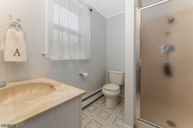 11 Cemetery Road Blairstown, NJ 07825 - Photo 26 of 34 a bathroom with a sink and a toilet