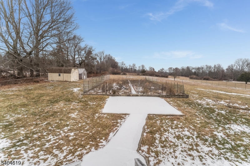 11 Cemetery Road Blairstown, NJ 07825 - Photo 34 of 34 a view of a lake with houses in the back