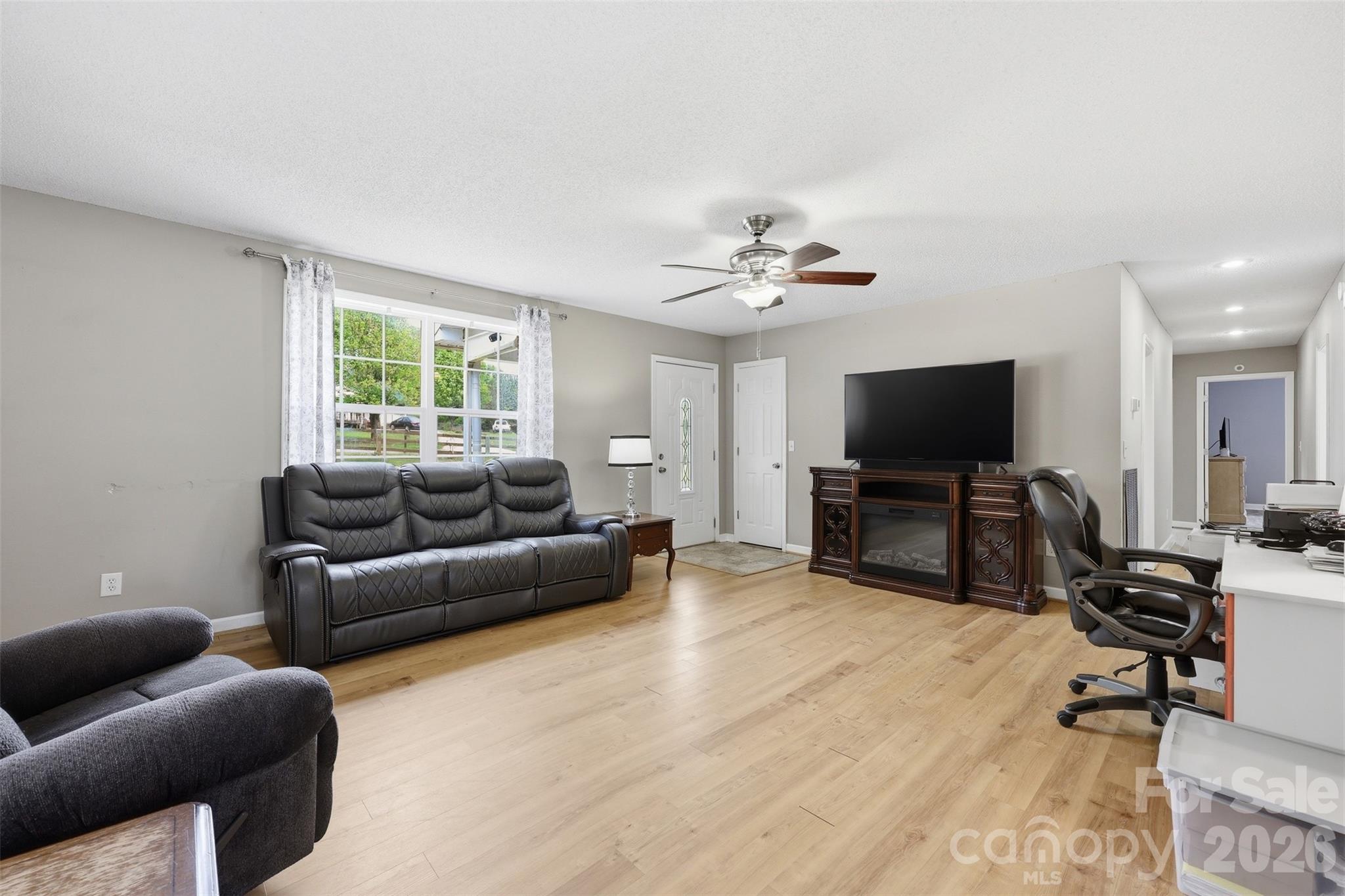 1214 Eastcreek Road Fort Lawn, SC 29714 - Photo 11 of 28 a living room with furniture and a flat screen tv