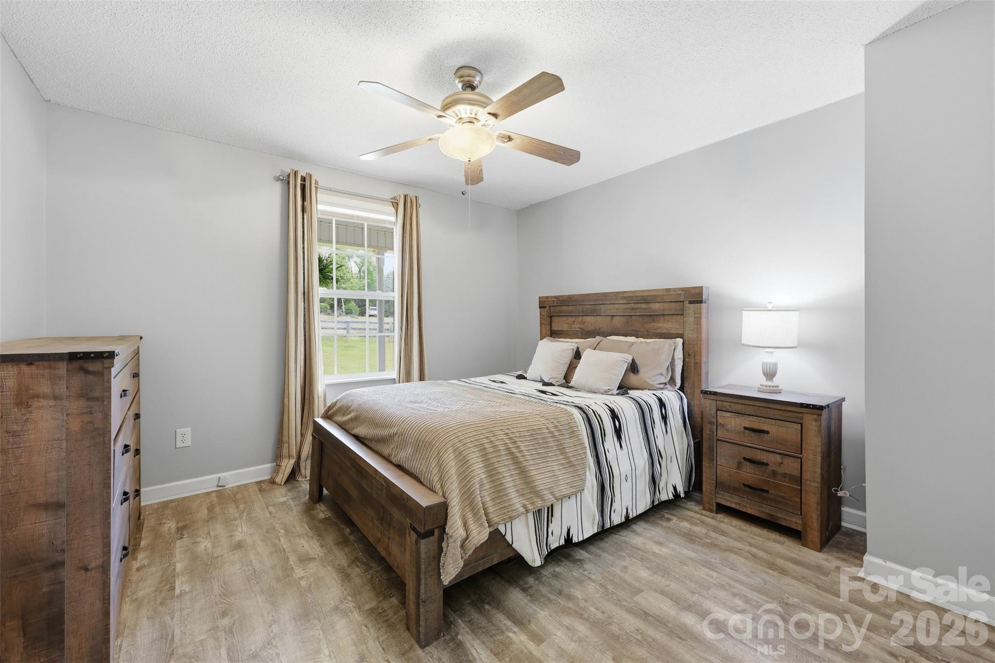 1214 Eastcreek Road Fort Lawn, SC 29714 - Photo 15 of 28 a bedroom with a bed and window
