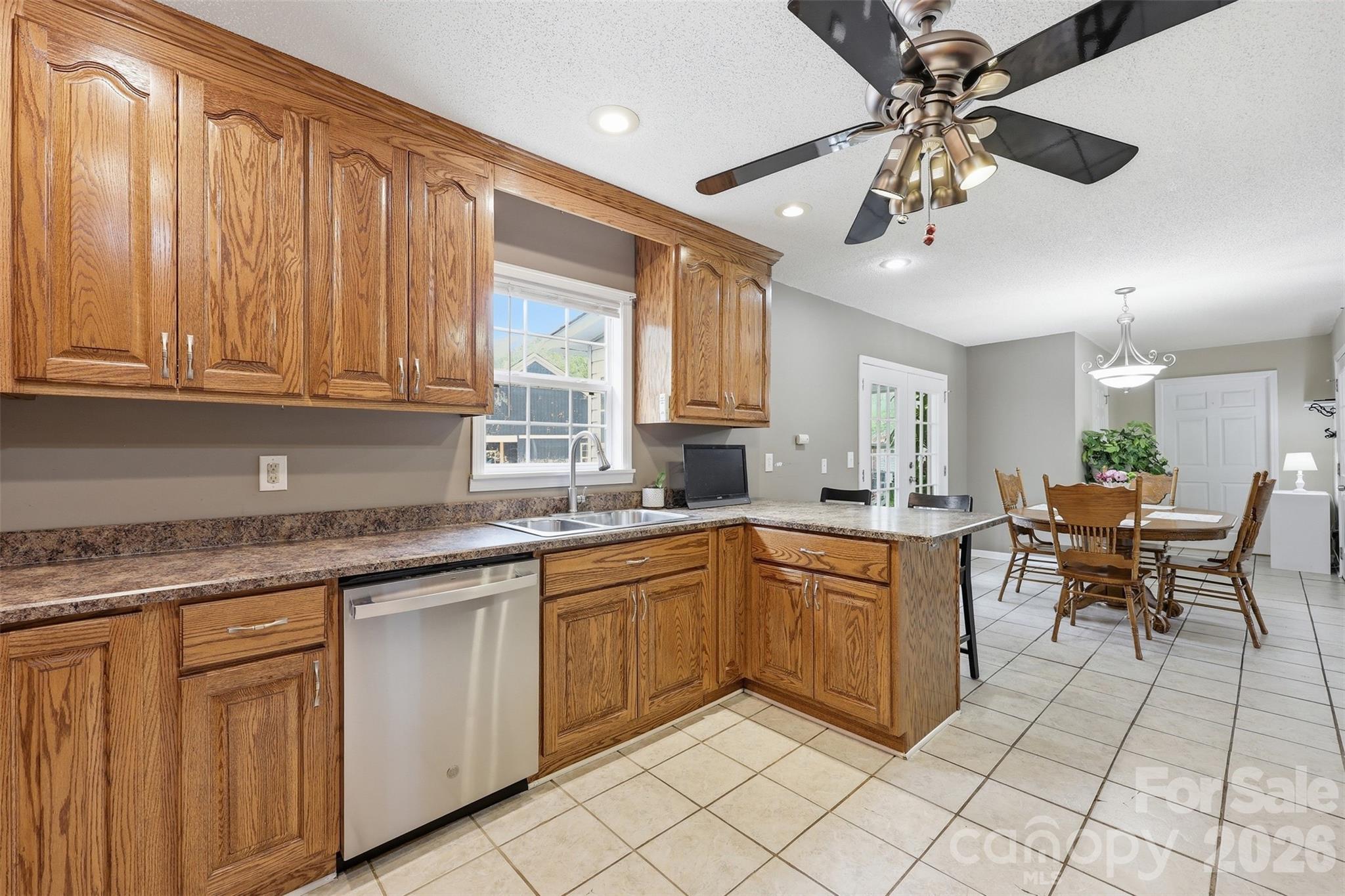 1214 Eastcreek Road Fort Lawn, SC 29714 - Photo 7 of 28 a kitchen with cabinets and chairs