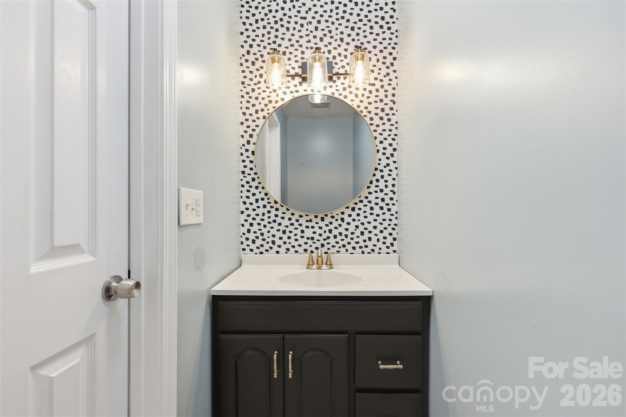 1214 Eastcreek Road Fort Lawn, SC 29714 - Photo 10 of 28 a bathroom with a sink and a mirror