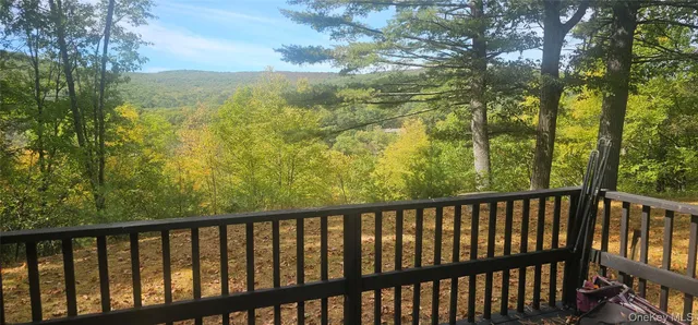 a view of a balcony with an outdoor space