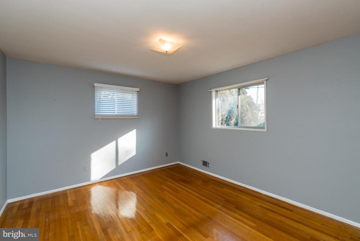 3325 Southgreen Road Baltimore, MD 21244 - Photo 14 of 29 Master bedroom with hardwood floors