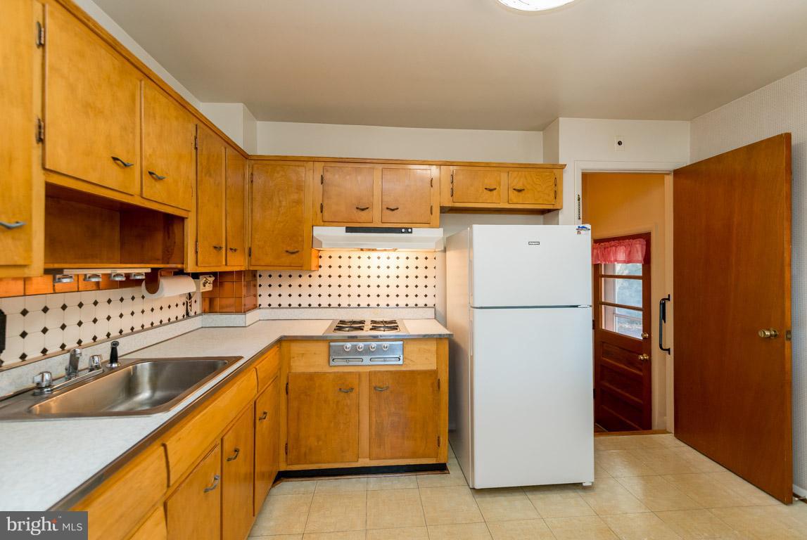 3325 Southgreen Road Baltimore, MD 21244 - Photo 8 of 29 Retro Kitchen with all wood Cabinetry