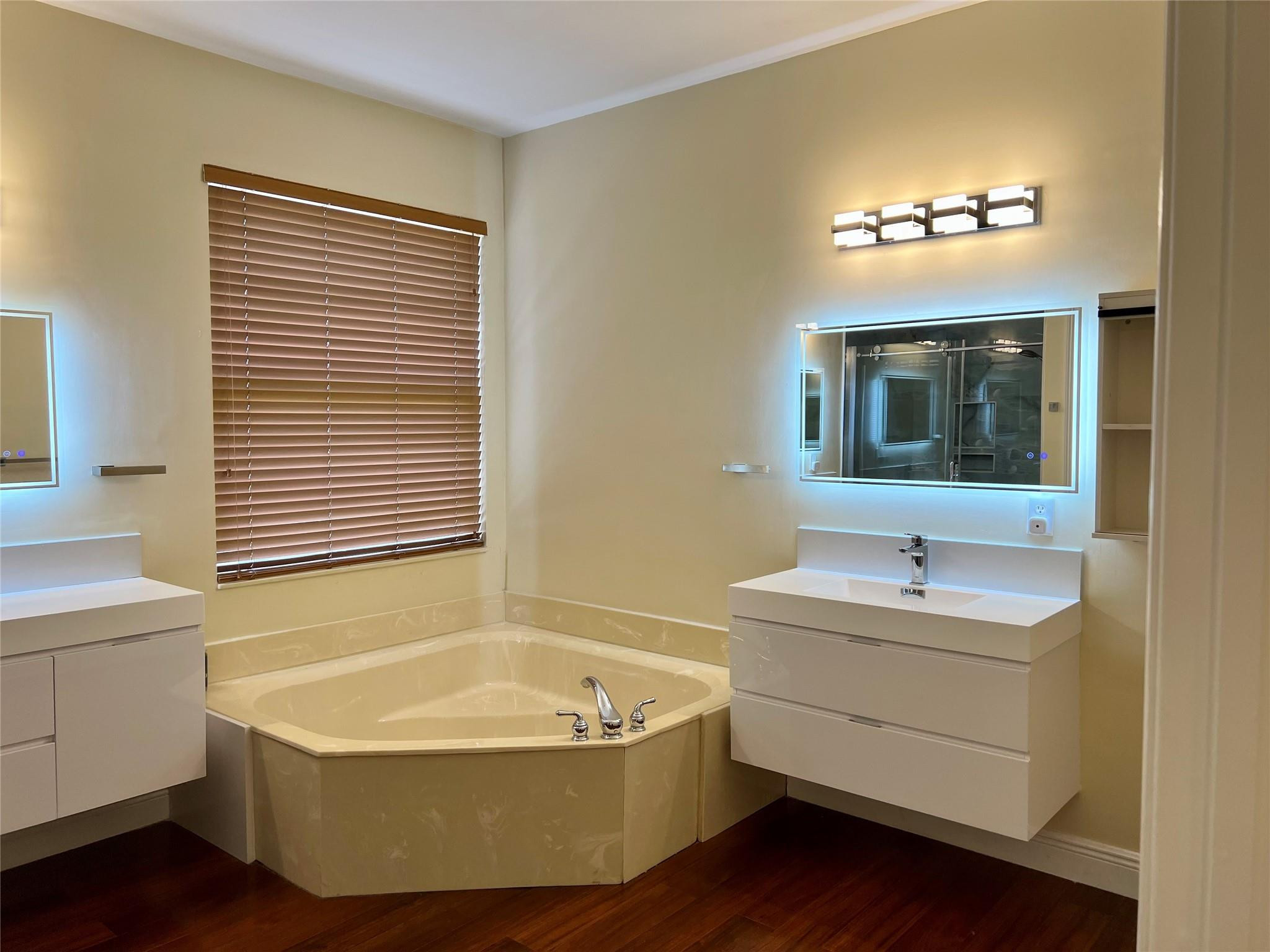5201 Southwest 173rd Avenue Miramar, FL 33029 - Photo 16 of 42 a bathroom with a tub a sink and a mirror