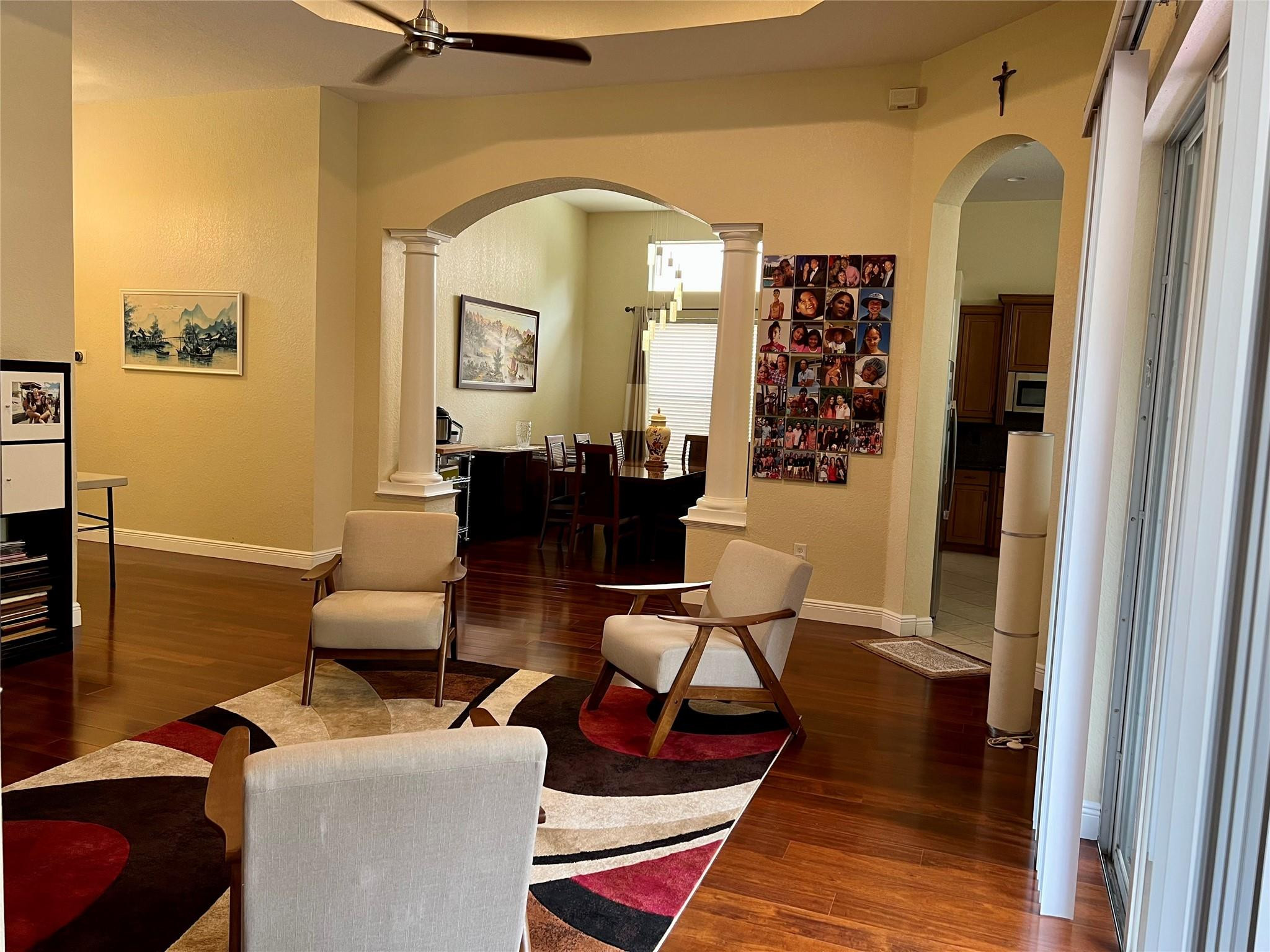 5201 Southwest 173rd Avenue Miramar, FL 33029 - Photo 19 of 42 a living room with furniture a couch and wooden floor