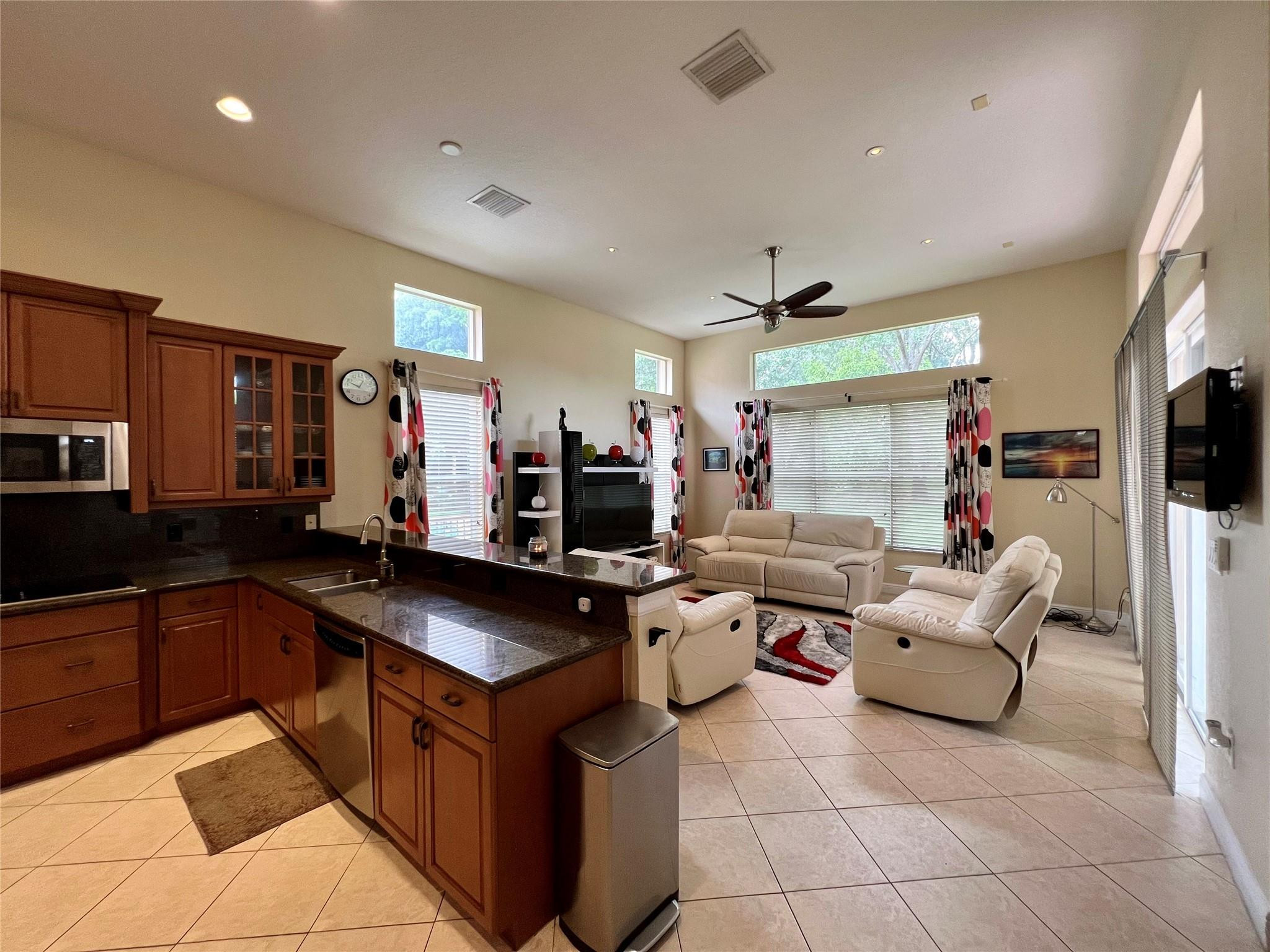5201 Southwest 173rd Avenue Miramar, FL 33029 - Photo 25 of 42 a kitchen with a sink and counter top space