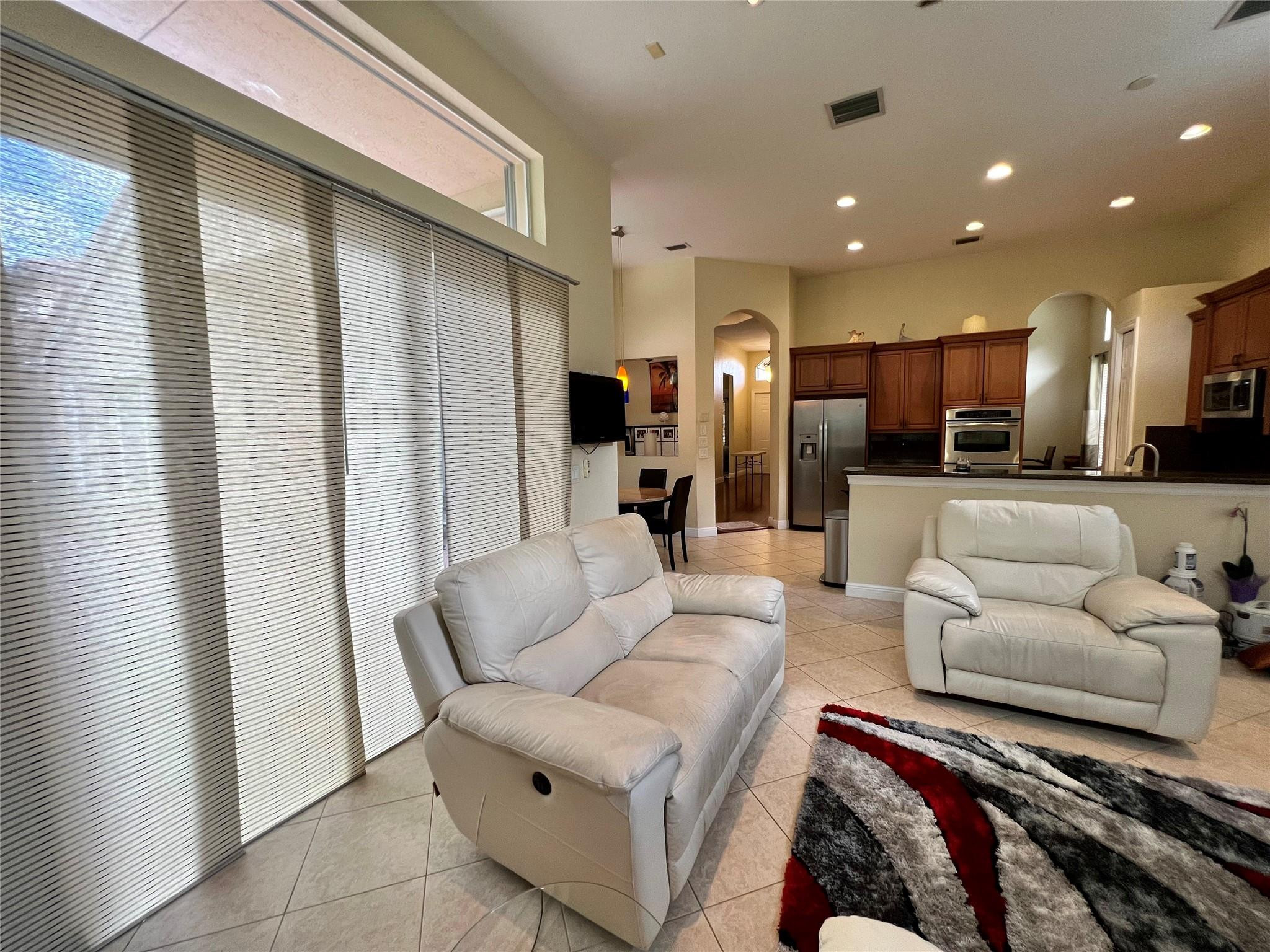 5201 Southwest 173rd Avenue Miramar, FL 33029 - Photo 30 of 42 a living room with furniture and a large window