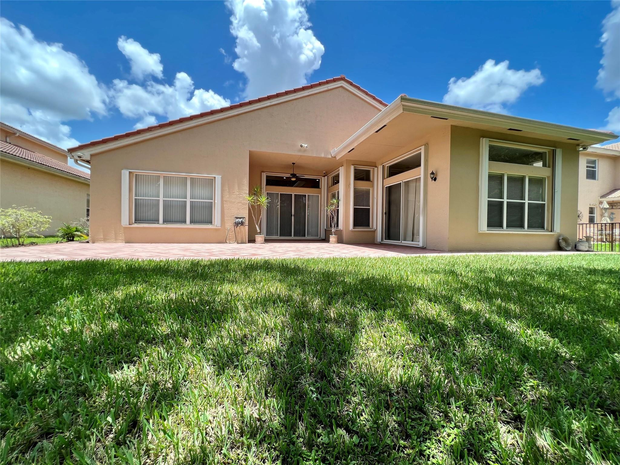 5201 Southwest 173rd Avenue Miramar, FL 33029 - Photo 39 of 42 front view of a house with a yard