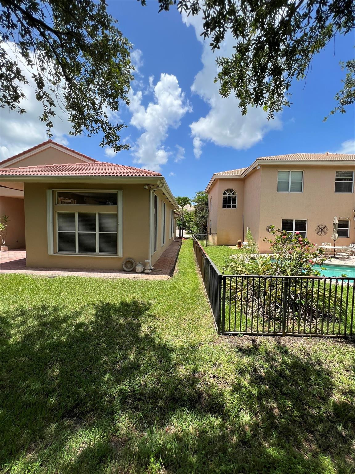 5201 Southwest 173rd Avenue Miramar, FL 33029 - Photo 41 of 42 a front view of a house with garden