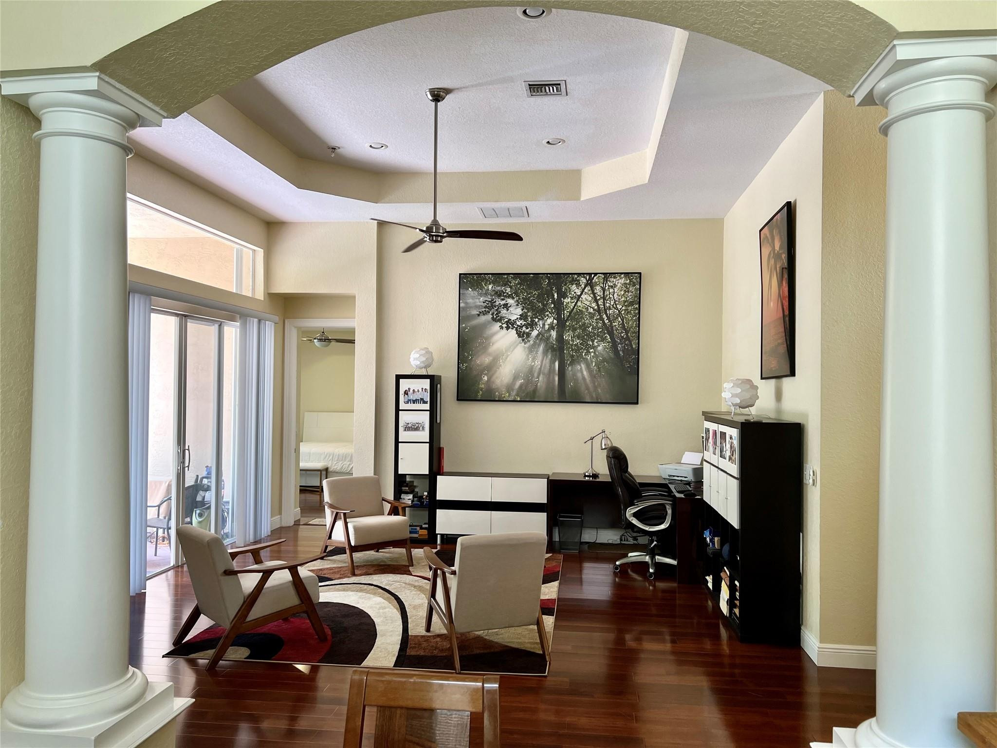 5201 Southwest 173rd Avenue Miramar, FL 33029 - Photo 10 of 42 a living room with furniture or couch and a wooden floor