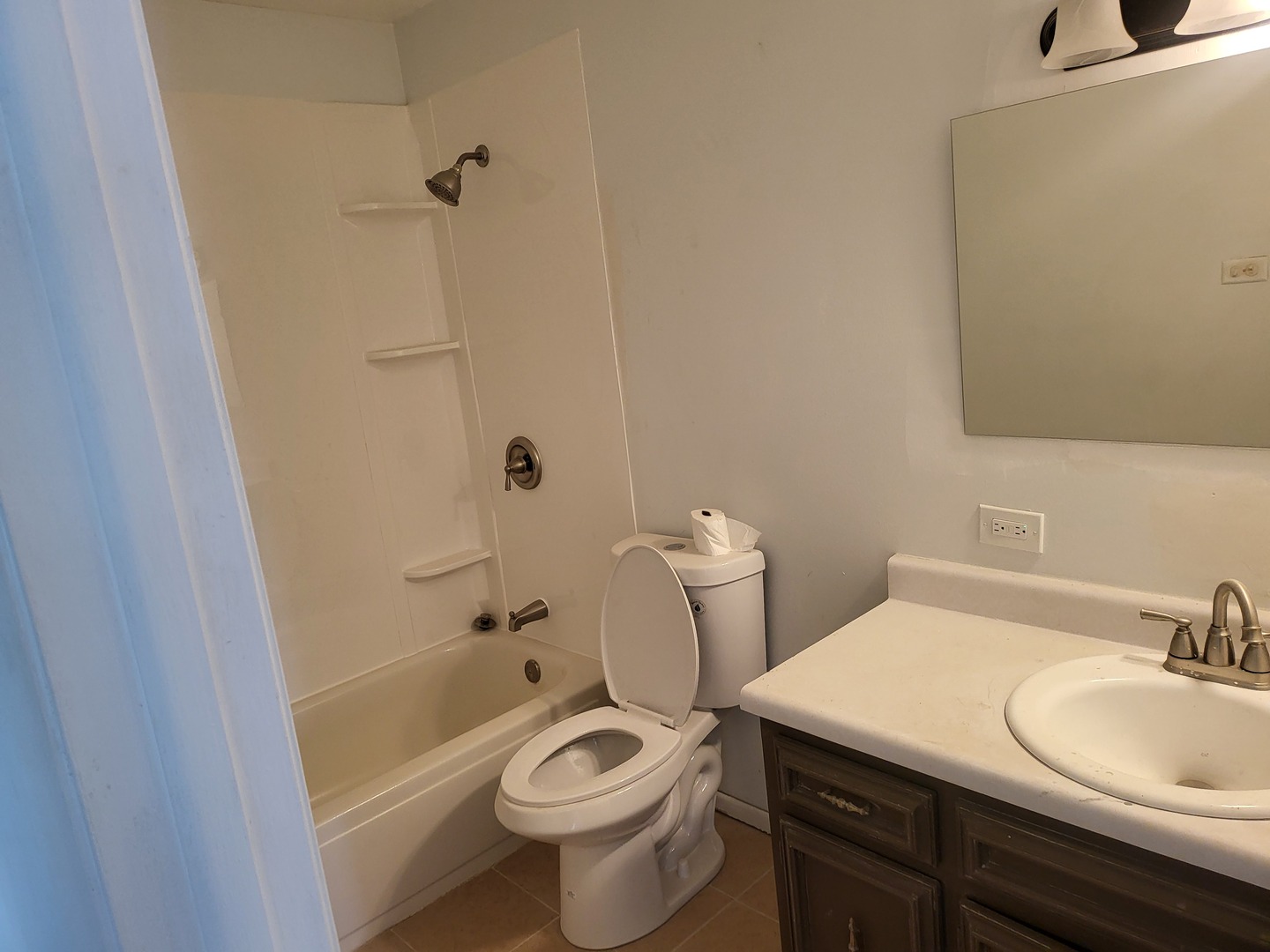 766 Mendocino Court, Unit 3 University Park, IL 60484 - Photo 5 of 5 a bathroom with a sink toilet vanity and shower