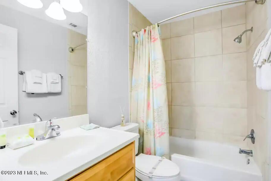 11 Clipper Court St. Augustine, FL 32080 - Photo 16 of 23 a bathroom with a sink and a mirror