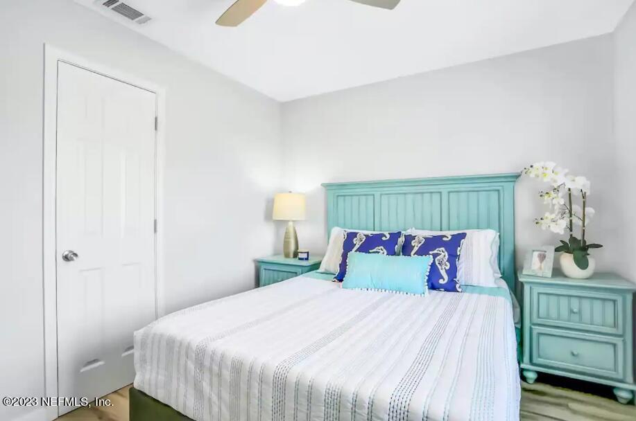 11 Clipper Court St. Augustine, FL 32080 - Photo 18 of 23 a bedroom with a bed and a window