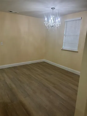 a view of a chandelier in a room