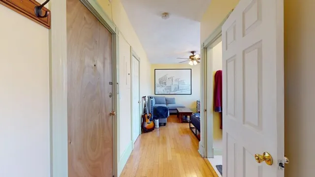 a view of a living room and bathroom