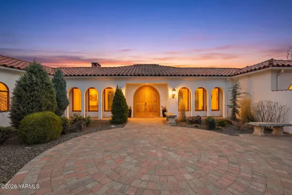 a view of outdoor space with patio furniture and a tub