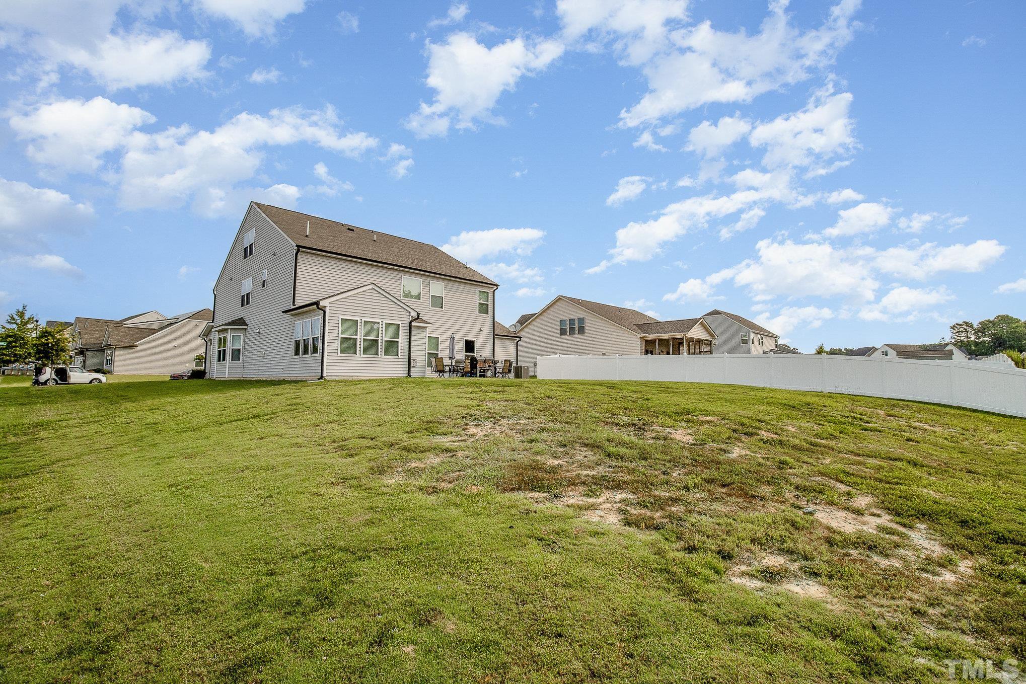 1513 Slate Ridge Road Knightdale, NC 27545 - Photo 36 of 36 a view of a house with a yard