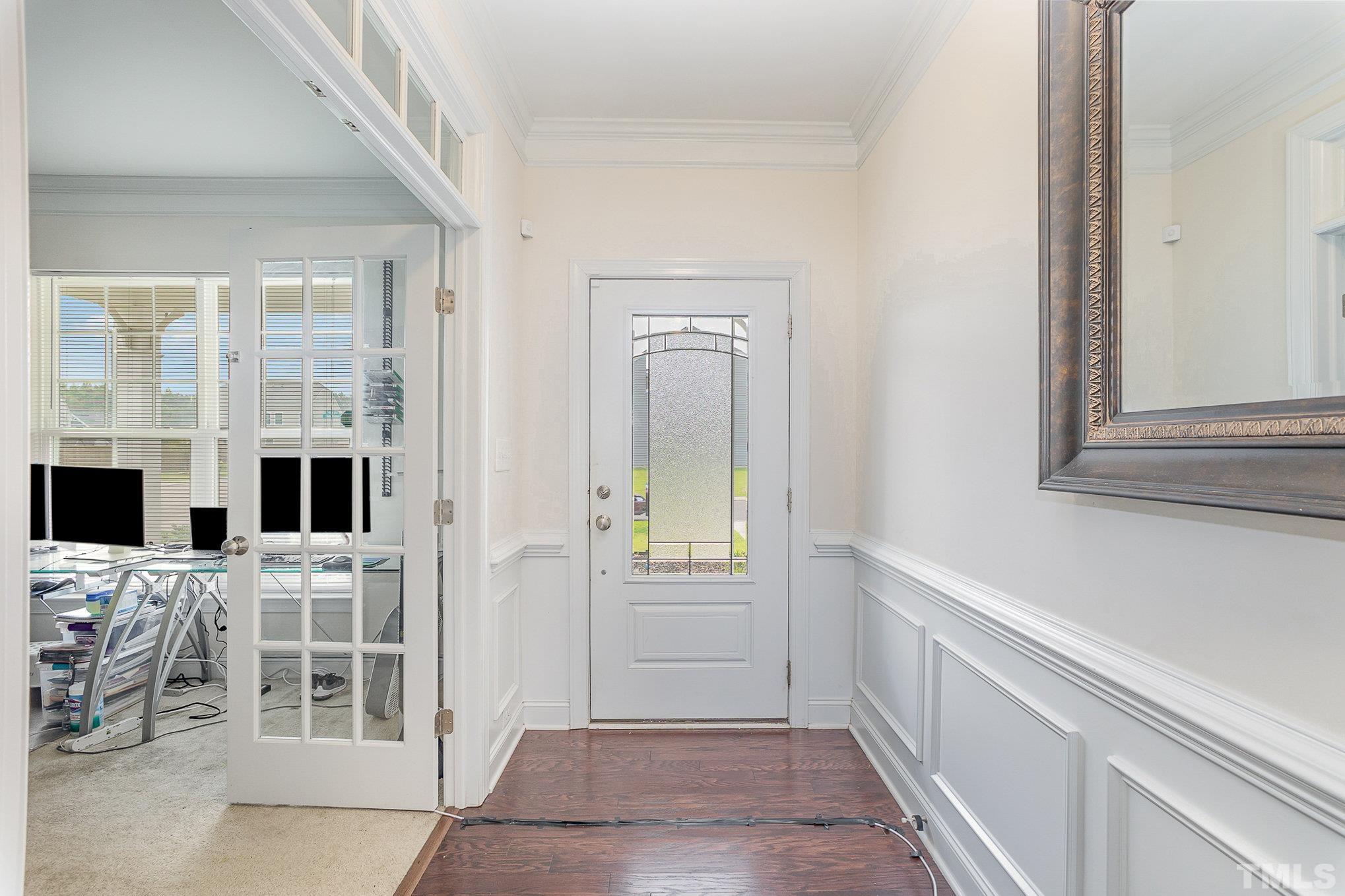 1513 Slate Ridge Road Knightdale, NC 27545 - Photo 5 of 36 a view of an entryway with livingroom