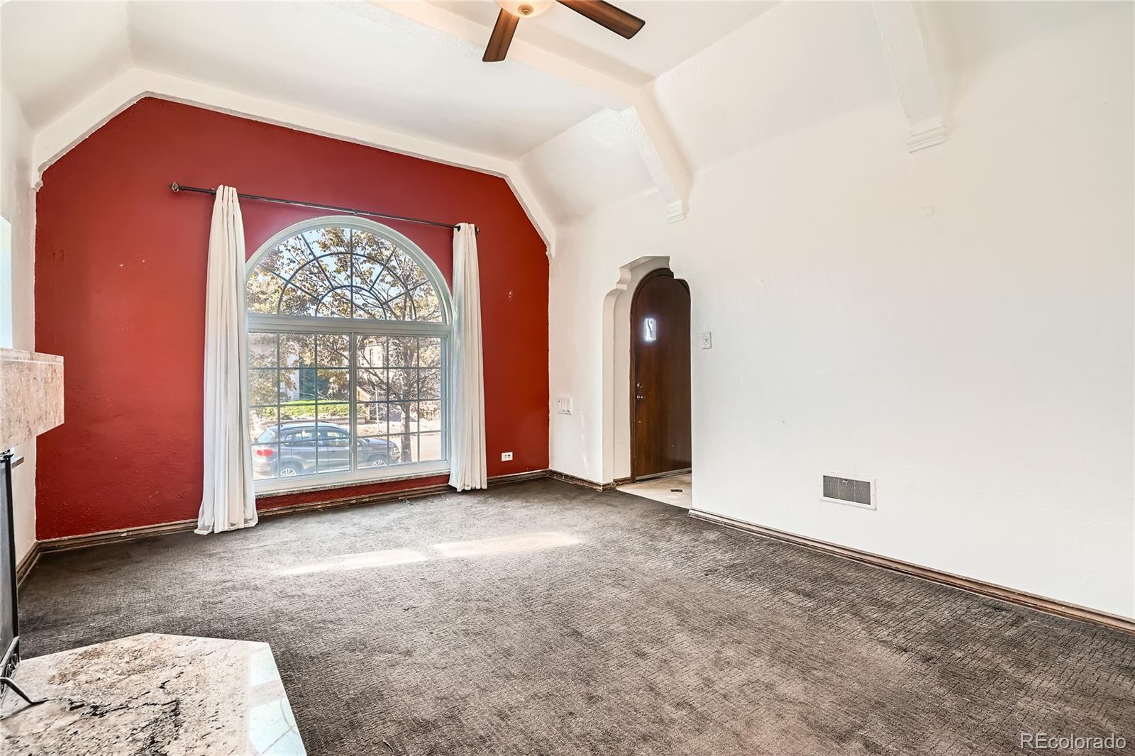 1460 Tennyson Street Denver, CO 80204 - Photo 6 of 44 an empty room with windows