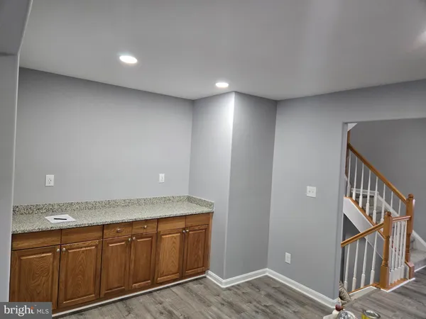 a view of entryway with wooden floor