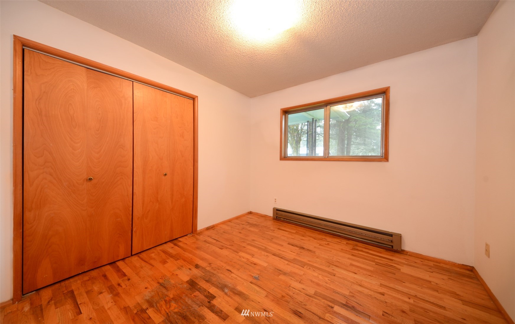 18524 Guava Street Southwest Rochester, WA 98579 - Photo 14 of 28 a view of an empty room with a window
