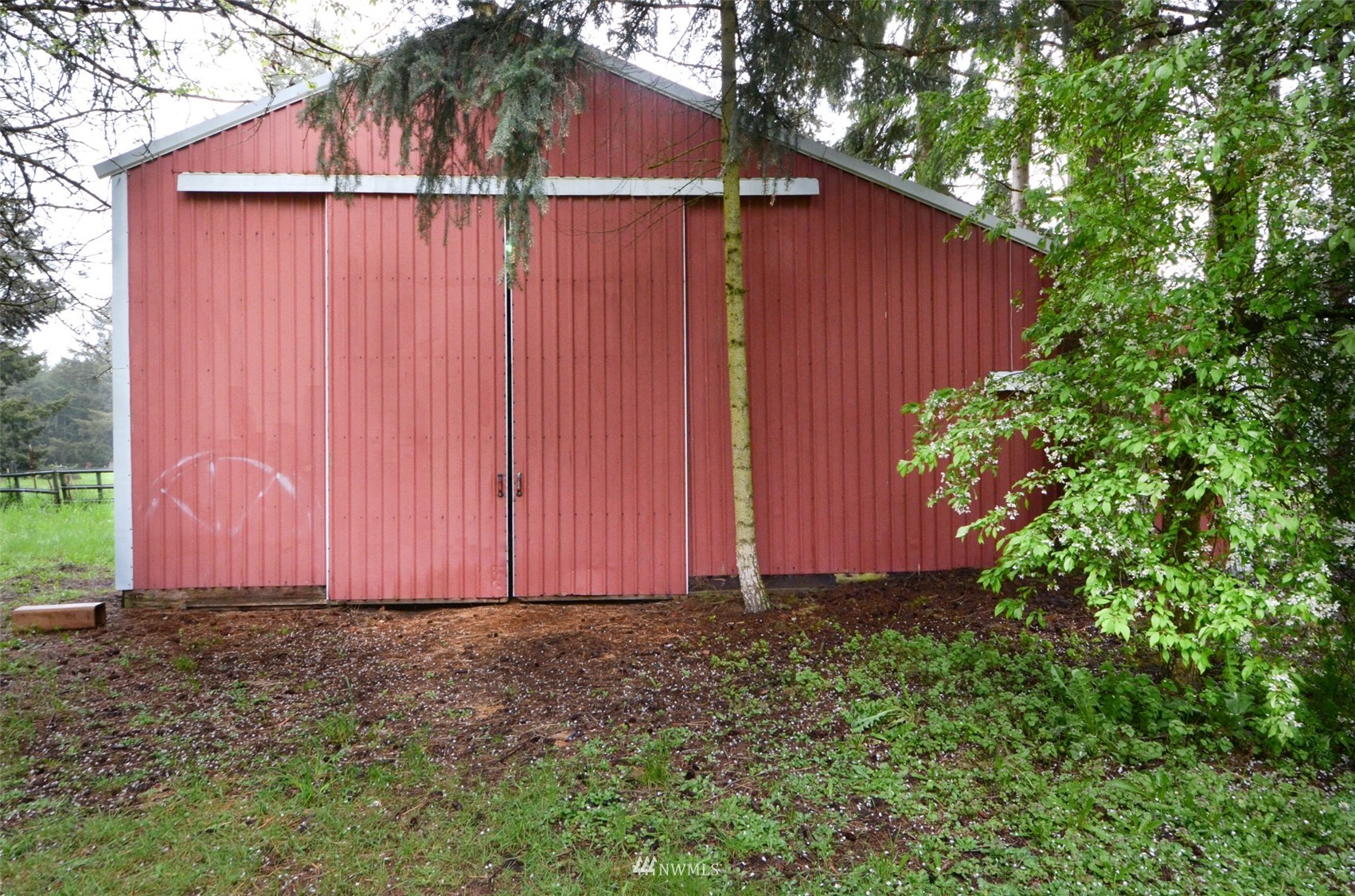 18524 Guava Street Southwest Rochester, WA 98579 - Photo 5 of 28 a view of barn with a small yard