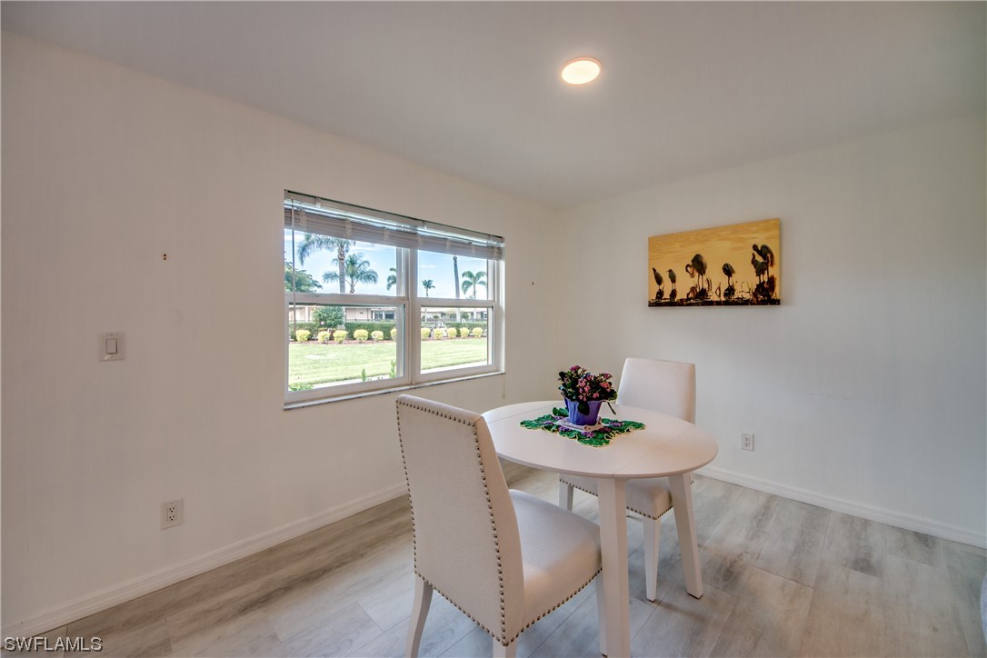 5585 Buring Court Fort Myers, FL 33919 - Photo 12 of 34 a dining room with furniture and window