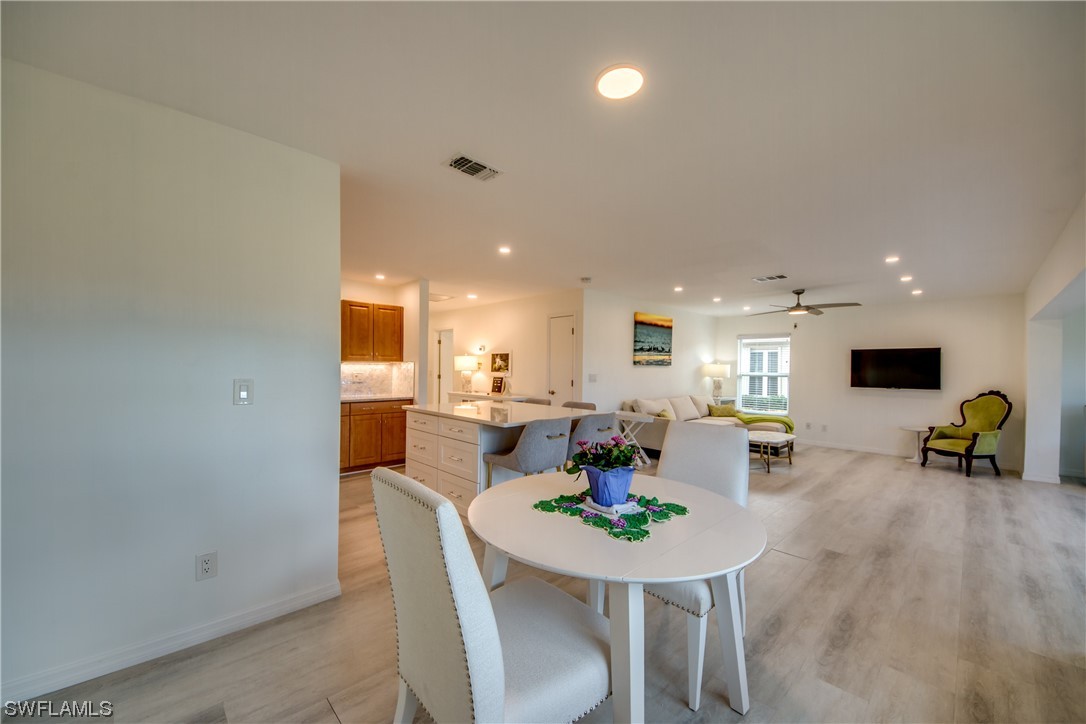 5585 Buring Court Fort Myers, FL 33919 - Photo 14 of 34 a view of a dining room with furniture