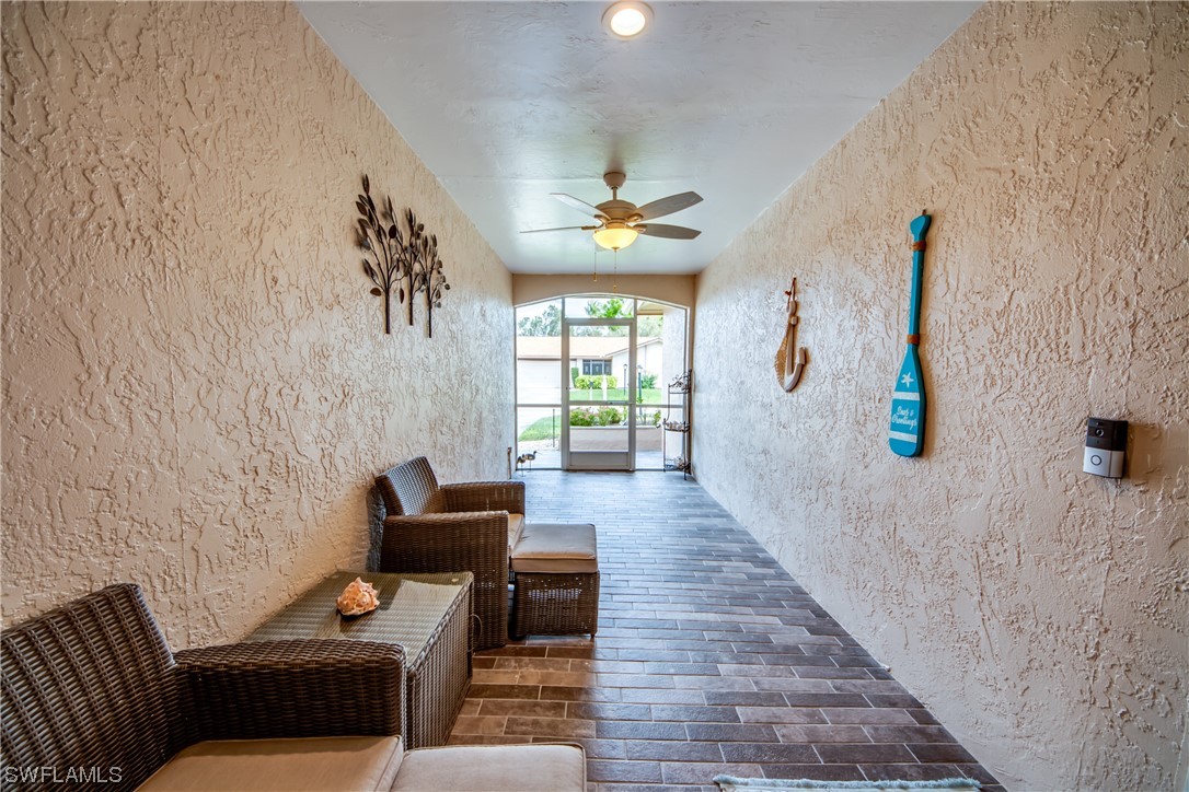5585 Buring Court Fort Myers, FL 33919 - Photo 2 of 34 a living room with furniture and a window